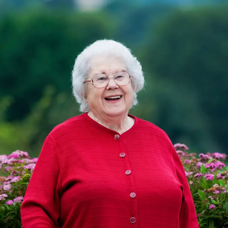 Woman in red smiling